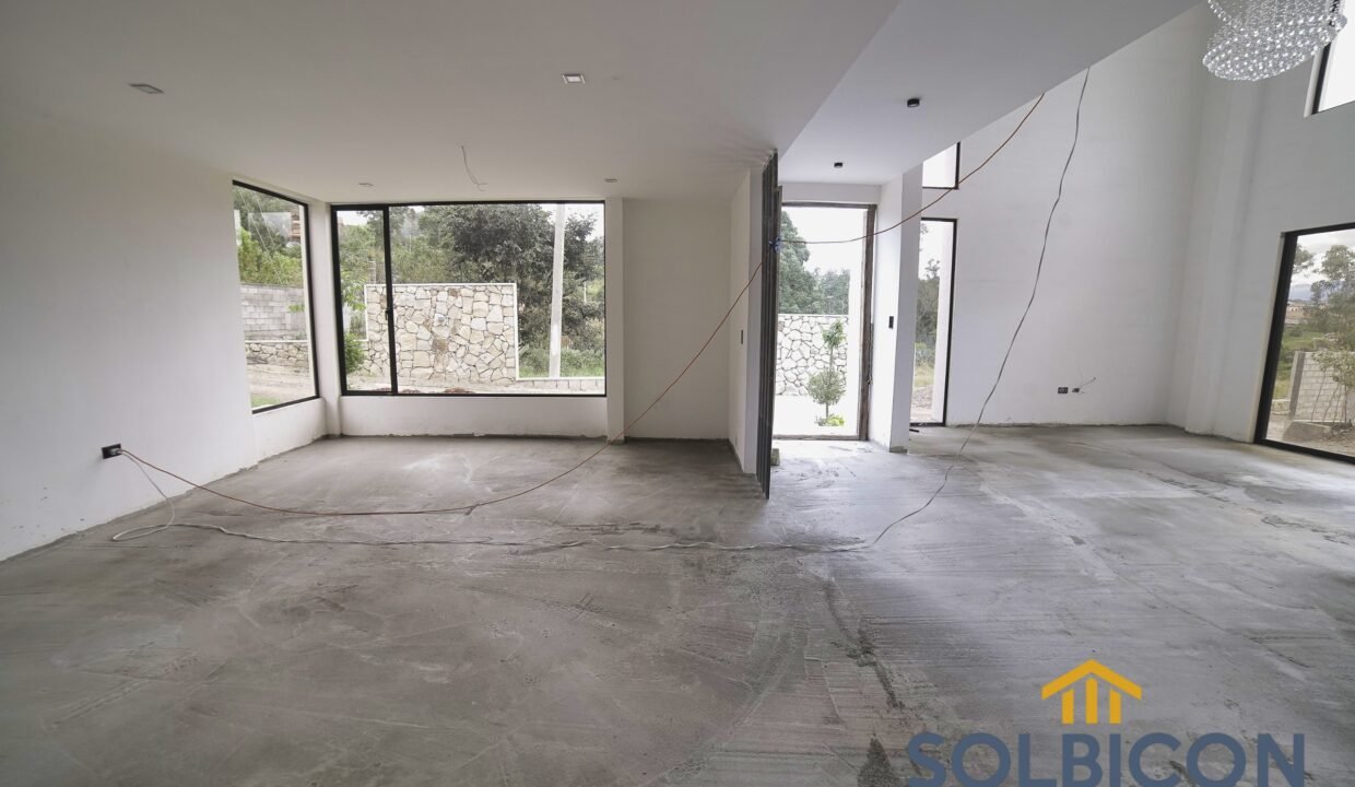 cocina y sala chaullabamba de cuatro habitaciones